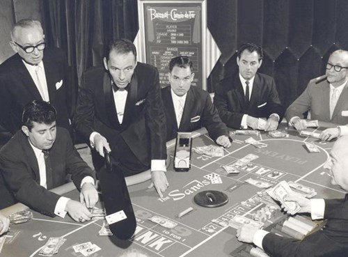 Baccarat Game - Everything You Need to know 1 B&W photo of players Baccarat on the table